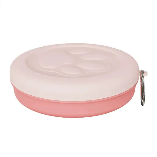 Portable plastic dog food bowl with separate snack compartment in light pink colour.