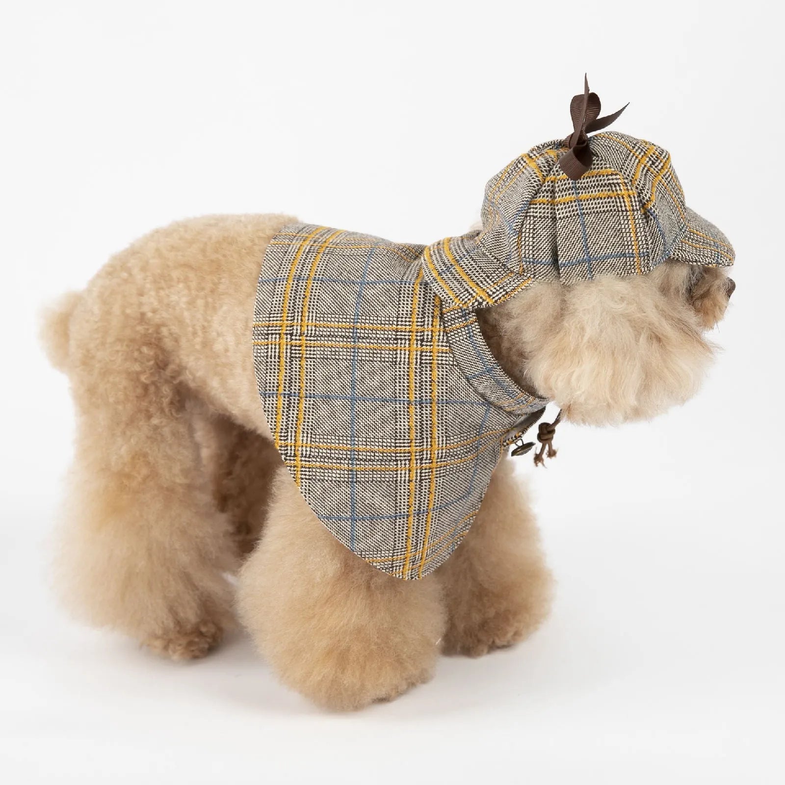 Camel-coloured cotton detective cloak for a dog on a mannequin, showing the hood with adjustable hat.
