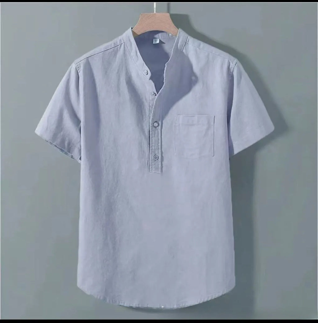 Men's loose-fit solid colour linen shirt with a stand collar and short sleeves on a hanger.