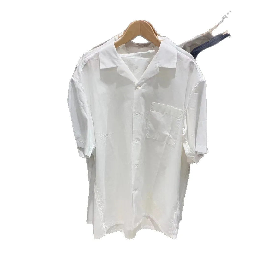 Man wearing a beige modal cotton open collar cardigan-style casual shirt.