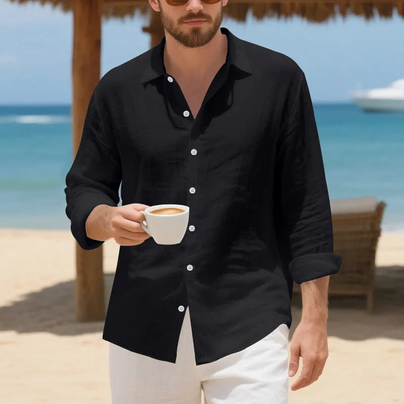 Man wearing a loose-fit linen casual shirt in a light blue colour, showing the non-iron style.