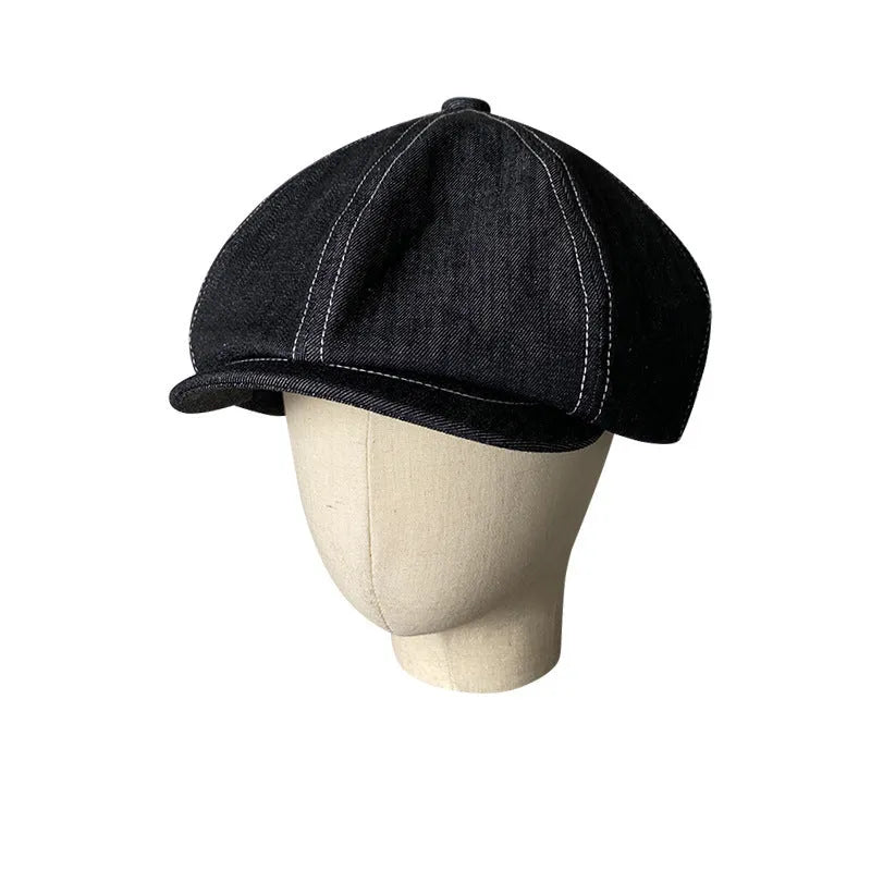 Black cotton Japanese denim beret hat with retro octagonal design shown on adult model
