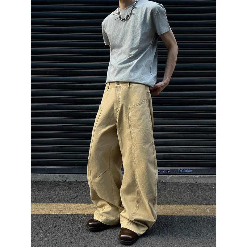Men's khaki cotton straight-leg trousers with American retro styling laid flat