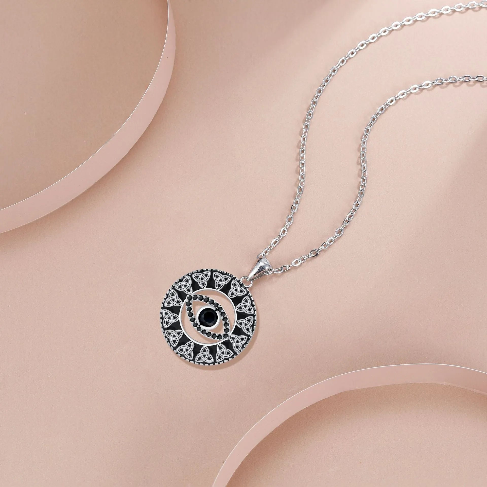 Copper Devil's Eye pendant necklace with electroplated finish and cross chain for women.