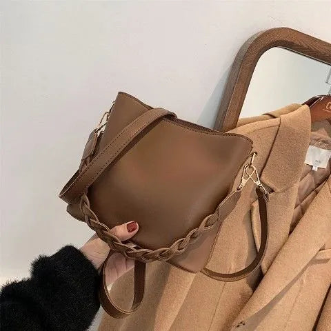 Retro style woven PU crossbody bucket bag in neutral colour