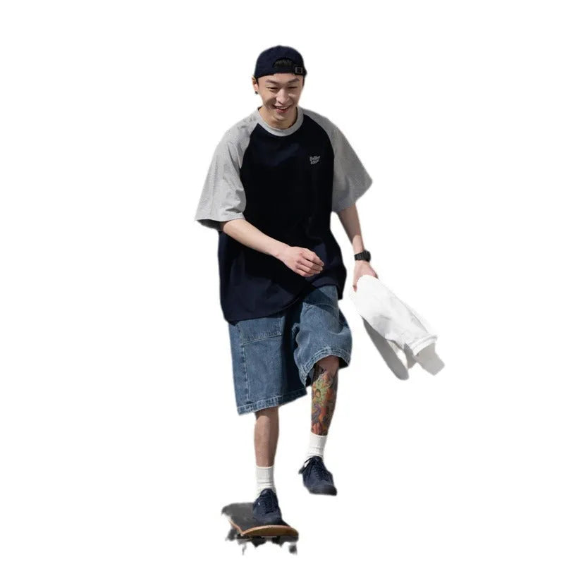 Men's blue Japanese raglan sleeve T-shirt with loose pullover fit on hanger