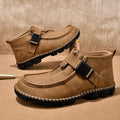 Casual black PU leather slip-on shoes with visible handmade stitching and a flat sole.