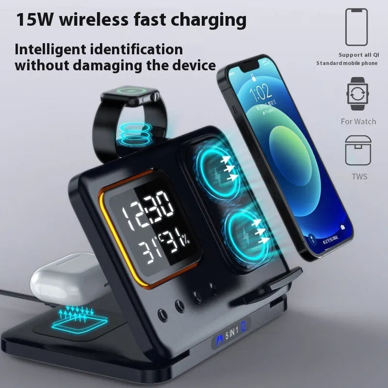 Black and white 5-in-1 wireless charging dock station with phone, watch and earphones charging, showing LED clock display.