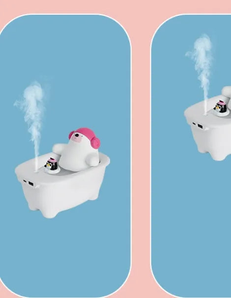 White USB-powered portable air humidifier and essential oil diffuser on a desk