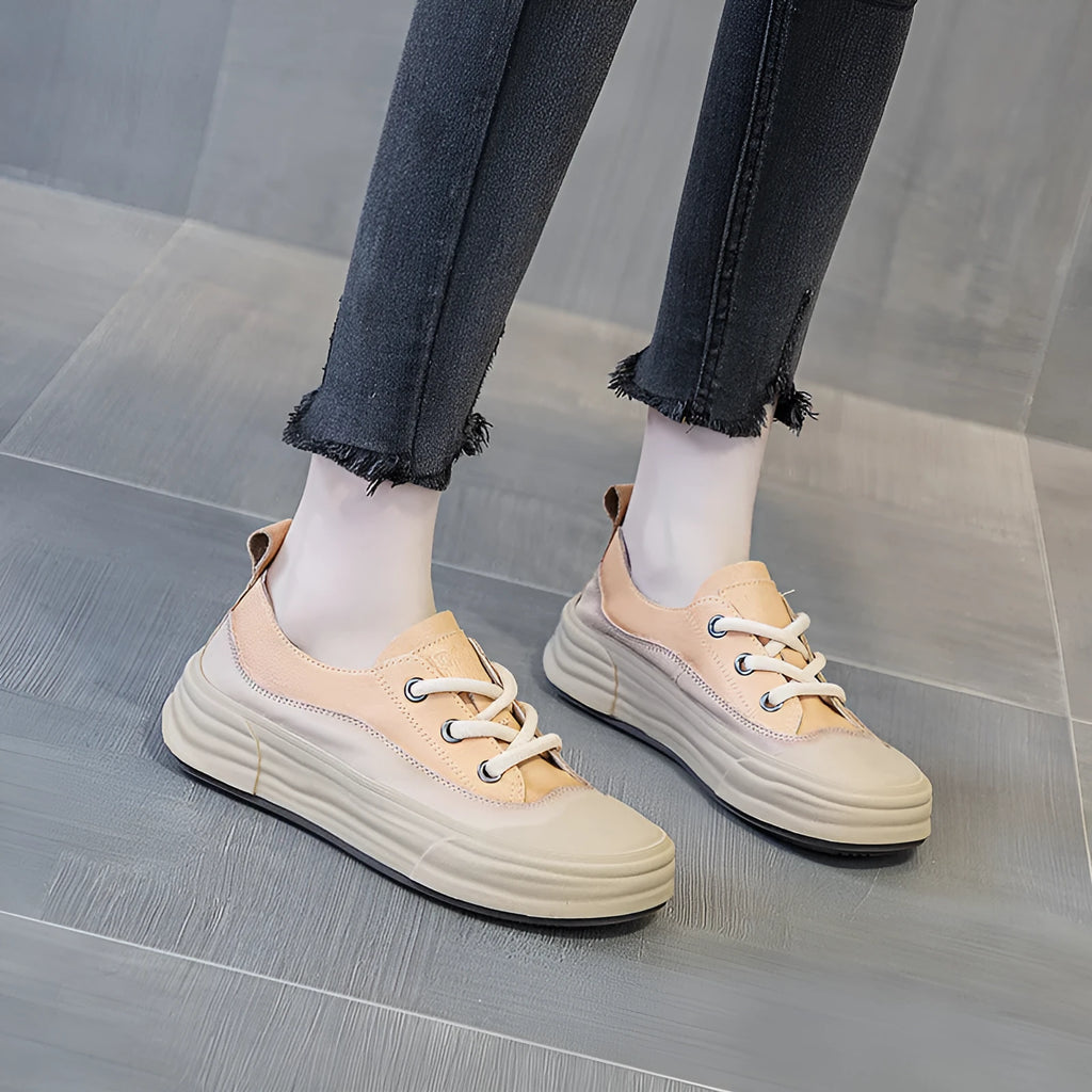 Women's leather low-top platform sneakers in matcha green, purple, and orange colours with front lace-up.