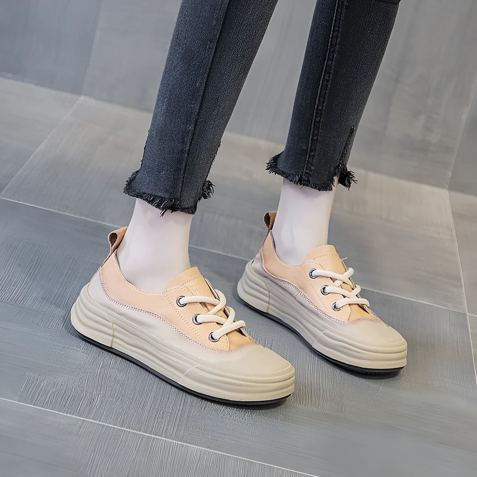 Women's leather low-top platform sneakers in matcha green, purple, and orange colours with front lace-up.