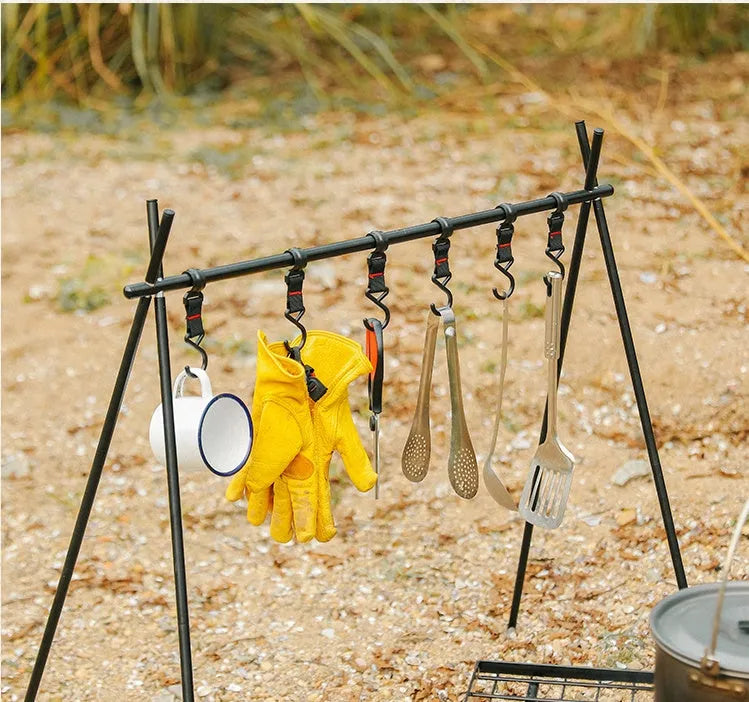 Large foldable aluminium alloy triangle clothes drying rack for camping with side hooks.