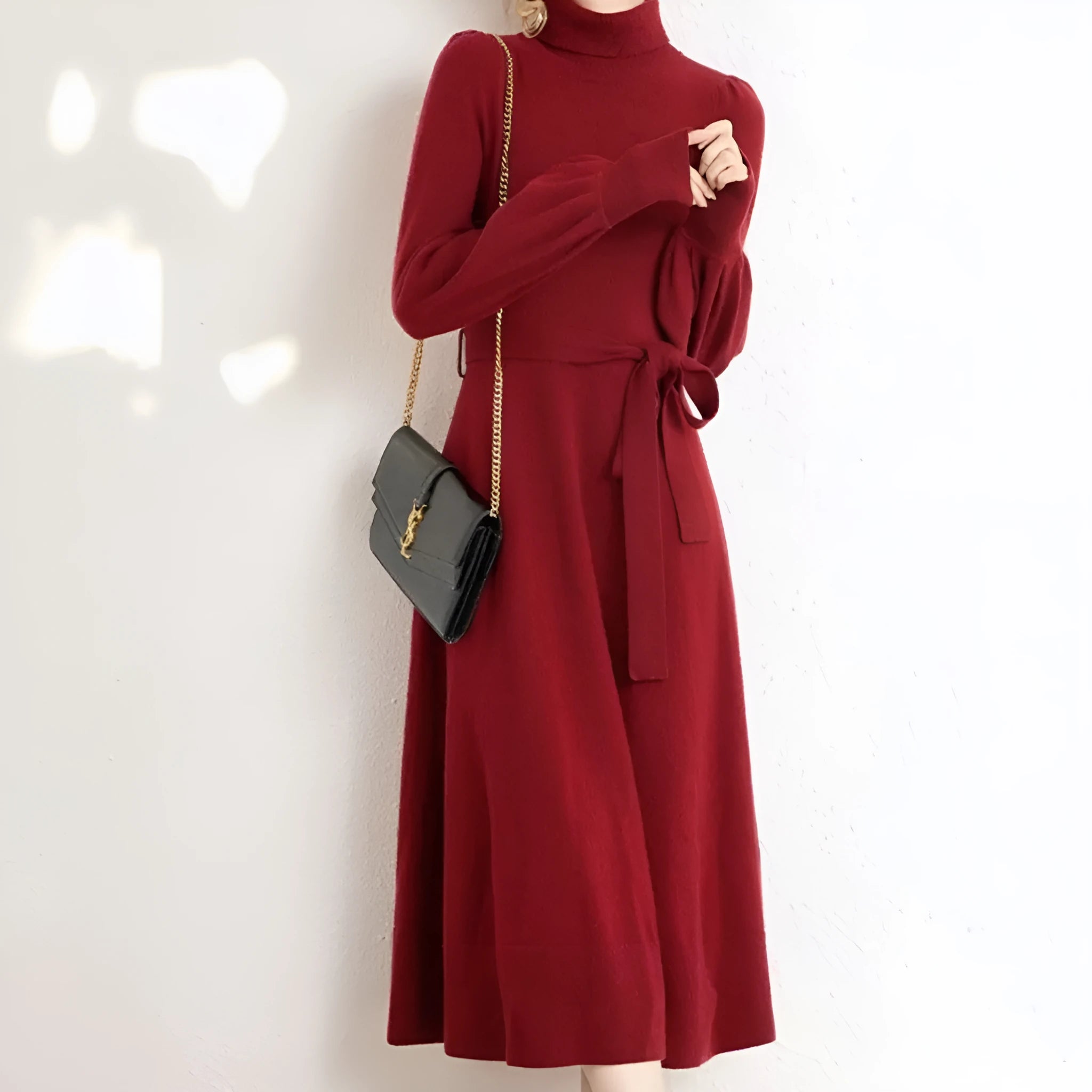 Turtleneck knit dress with elastic waist and loose hem in rose red colour