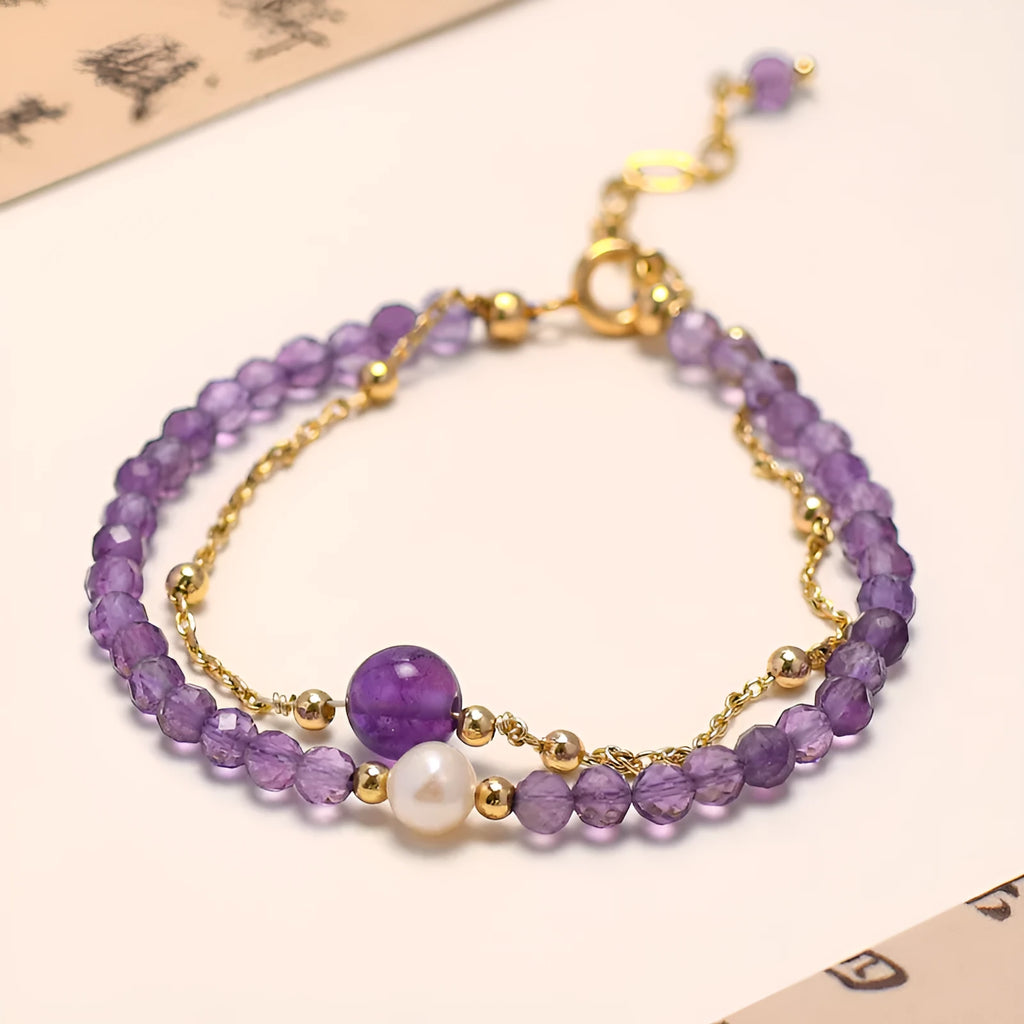 Purple amethyst crystal bracelet with diamond-shaped beads in a Chinese style design.