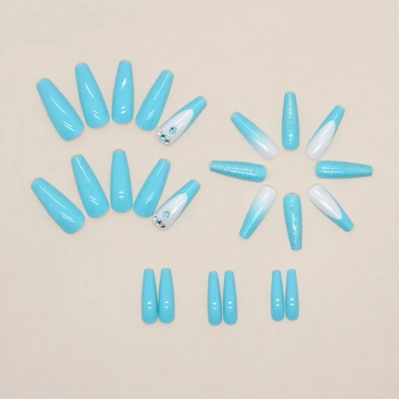 Long ballet false nails with blue diamond glitter debris effect