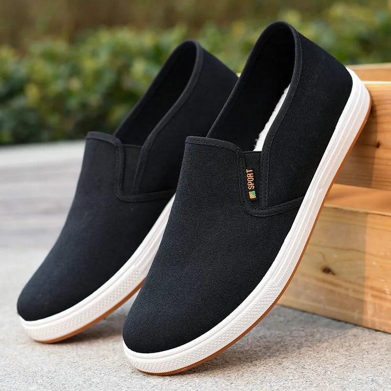 Men's black and blue canvas slip-on shoes with round toe and composite sole