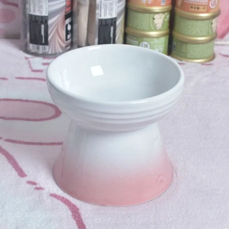 Ceramic pet bowl with high foot design showing anti-tumble stability feature