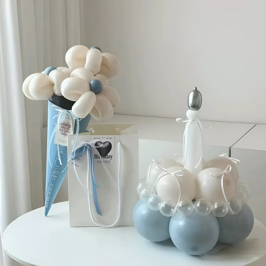 Round shaped balloon bouquet cake decoration DIY kit with colourful balloons arranged as party centrepiece