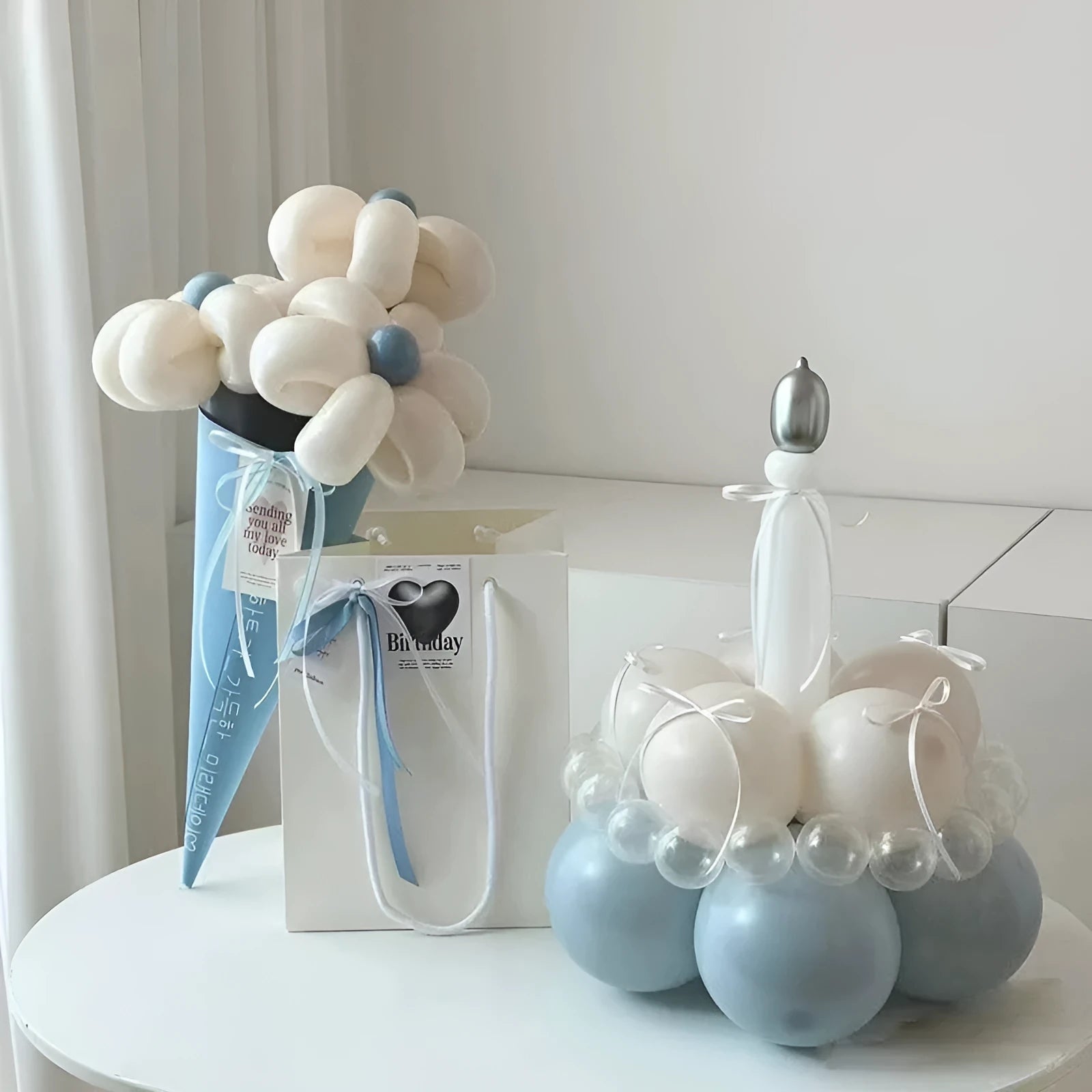 Round shaped balloon bouquet cake decoration DIY kit with colourful balloons arranged as party centrepiece