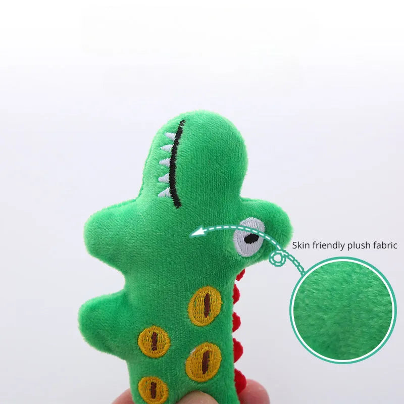 Plush green parrot-shaped cat toy with catnip, shown next to cow and crocodile versions.