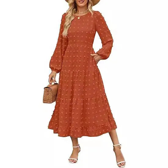 Beige women's casual dress with long ruffled sleeves, a round neck, and a high waist.