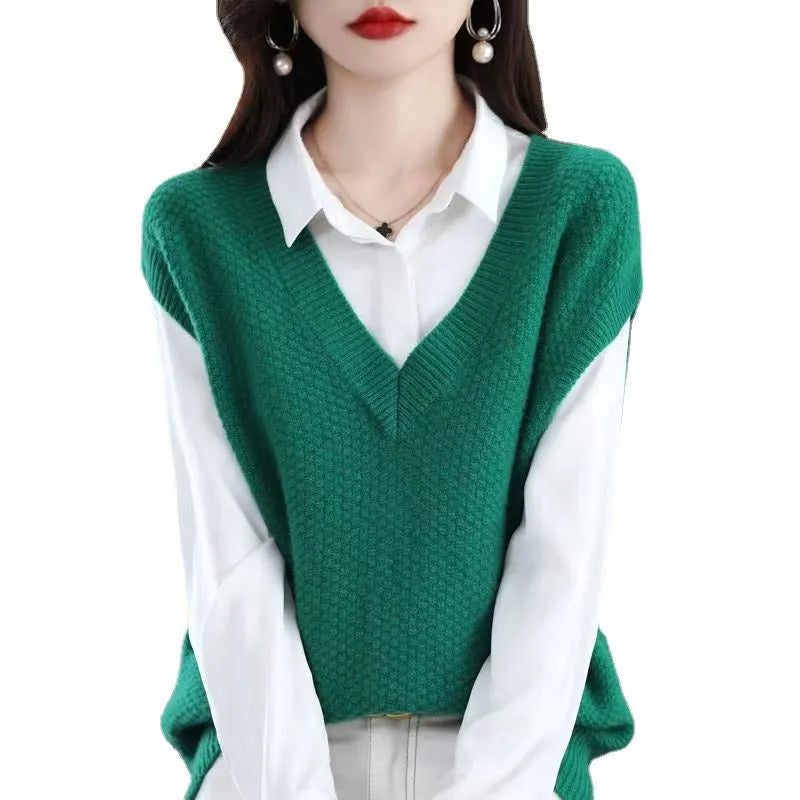 Women's creamy-white knitted vest with 3D pattern and V-neck, shown as sleeveless pullover.