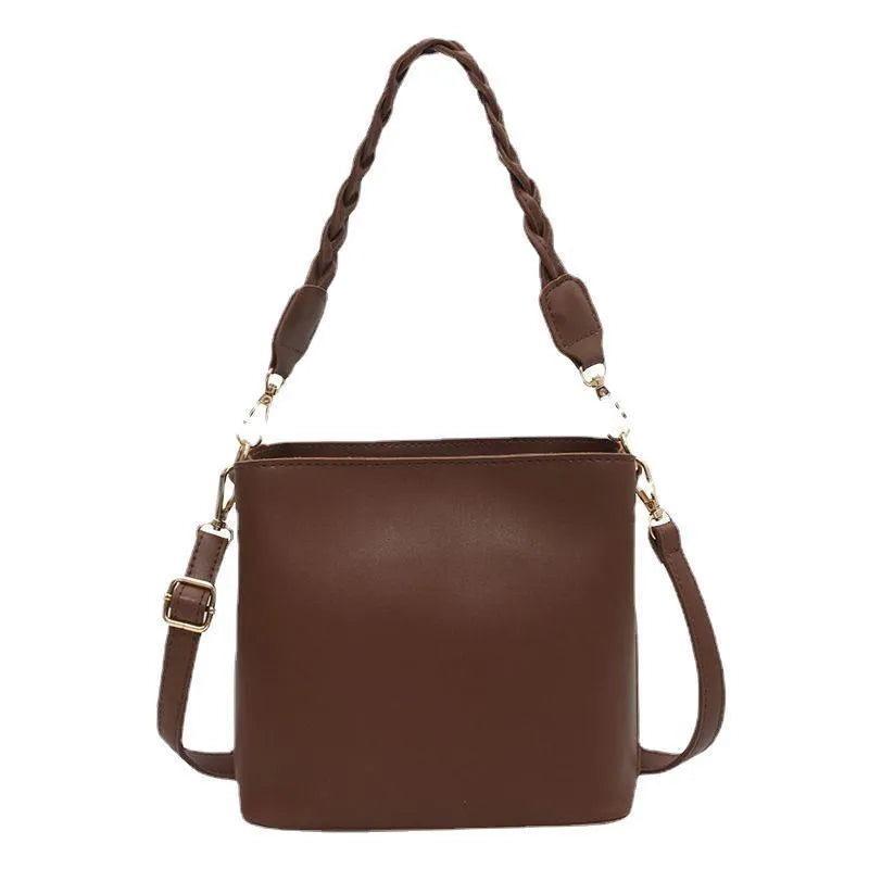 Retro style woven PU crossbody bucket bag in neutral colour