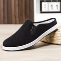 Men's casual slip-on sneakers in black with non-slip rubber sole and mesh lining