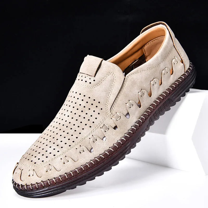 Men's brown casual slip-on shoes with round toe, hollowed detail, and sewn sole on a neutral background.