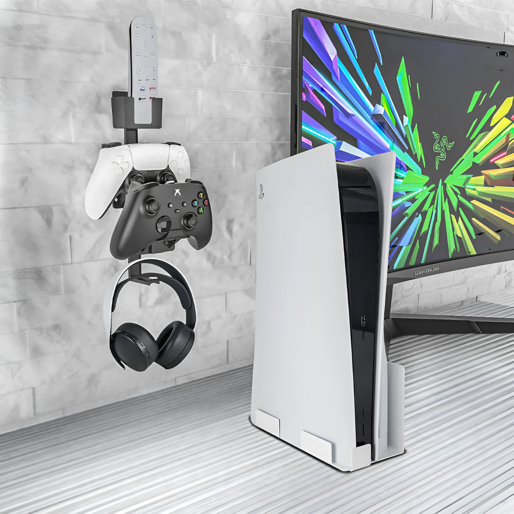 White adhesive wall hook holding a PS5 controller and gaming headset.