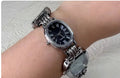 Vintage punk style purple watch for men with retro analogue clock face and bracelet strap