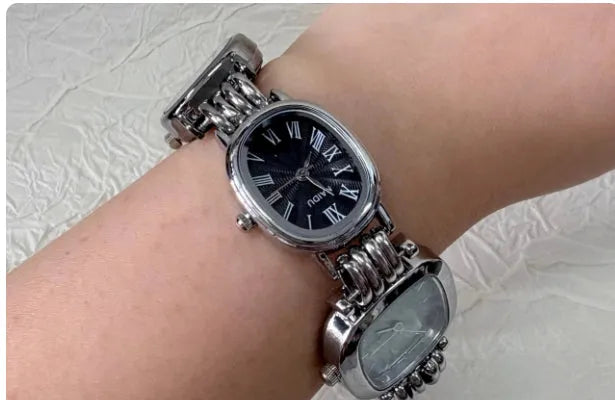 Vintage punk style purple watch for men with retro analogue clock face and bracelet strap