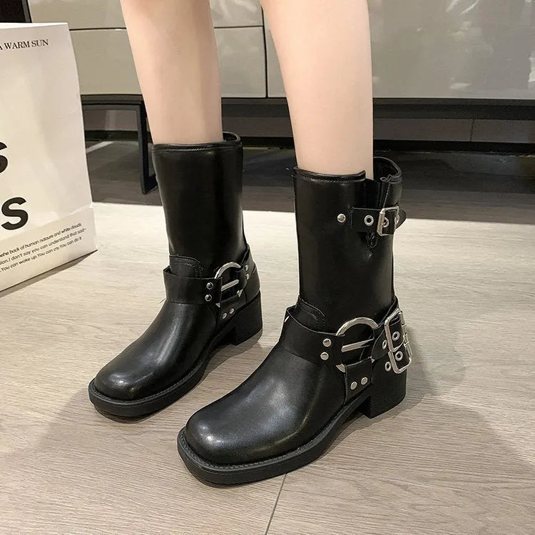 Women's black platform fashion boots with buckle detail and mid-calf length