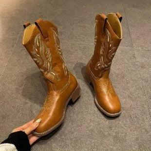 Brown women's embroidered Martin boots with mid-calf length, square heel, and round toe