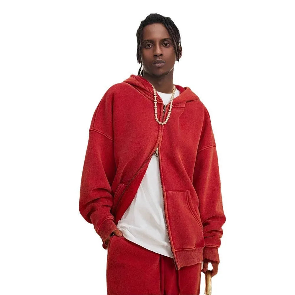 Man's washed cotton hooded cardigan with fleece lining and a double front zipper.