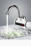 White electric instant water heater tap with digital temperature display for kitchen sink.