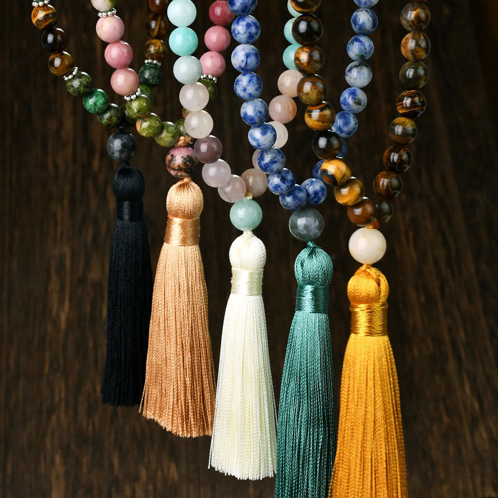 Long handmade Bohemian necklace with a natural stone tassel and mixed gem geometric pendant on an 81cm chain.