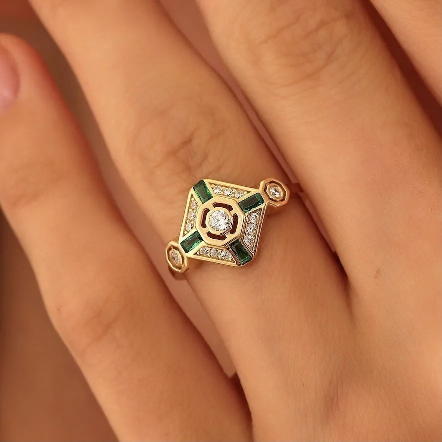 Ins style square geometric emerald diamond ring in lvzuan colour on a white background.