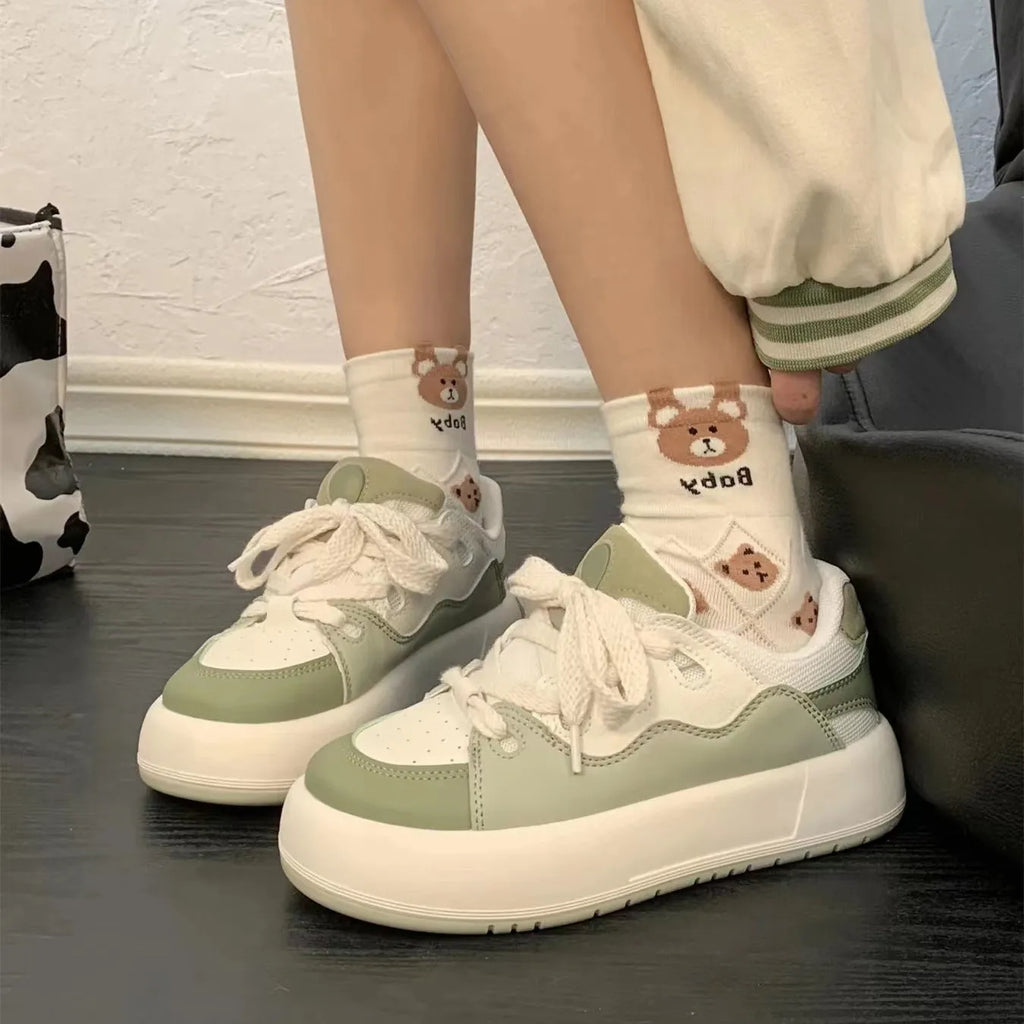 Green women's casual shoes with PU mesh upper, round toe, and flat non-slip sole.