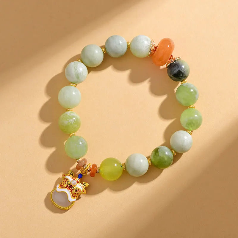 Green milk-in-water Xingshi jade pendant bracelet with 10mm geometric beads on elastic band