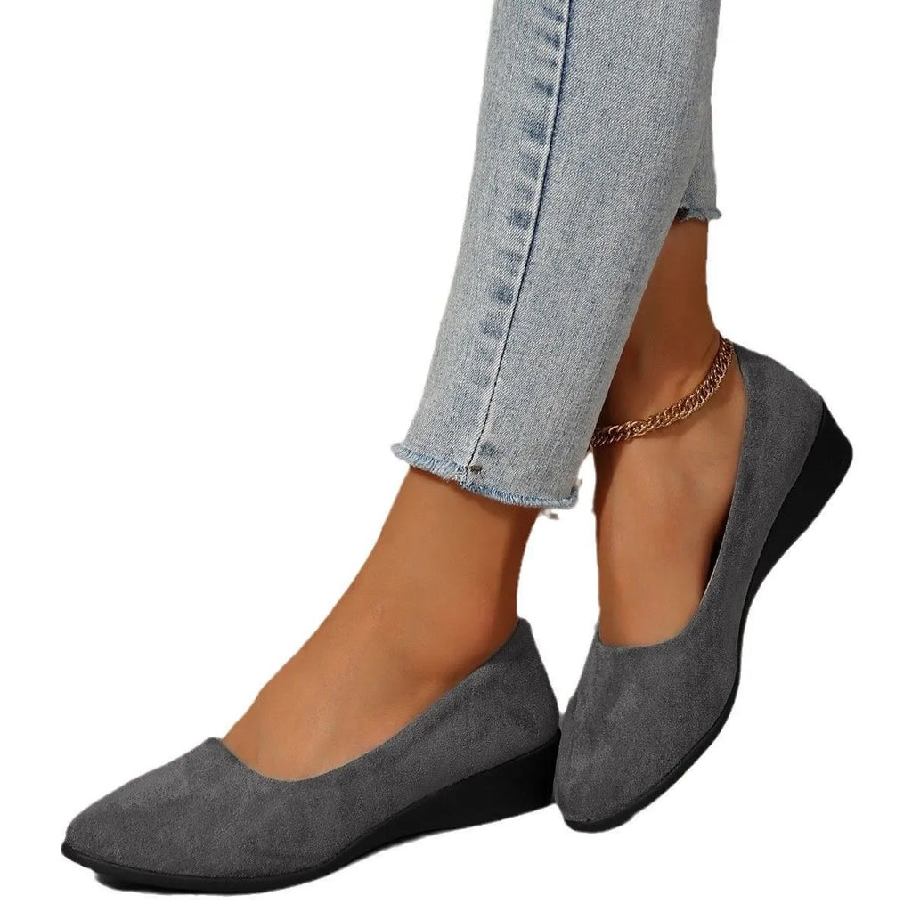 Women's casual wedge pumps with pointed toe, suede upper, and low rubber heel in multiple colour options