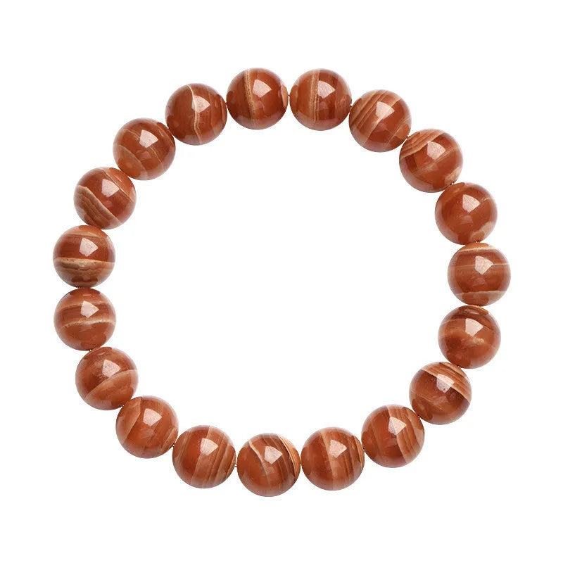 Natural Old Mine Rhodochrosite round beads bracelet from Peru showing manganese spar mineral colour