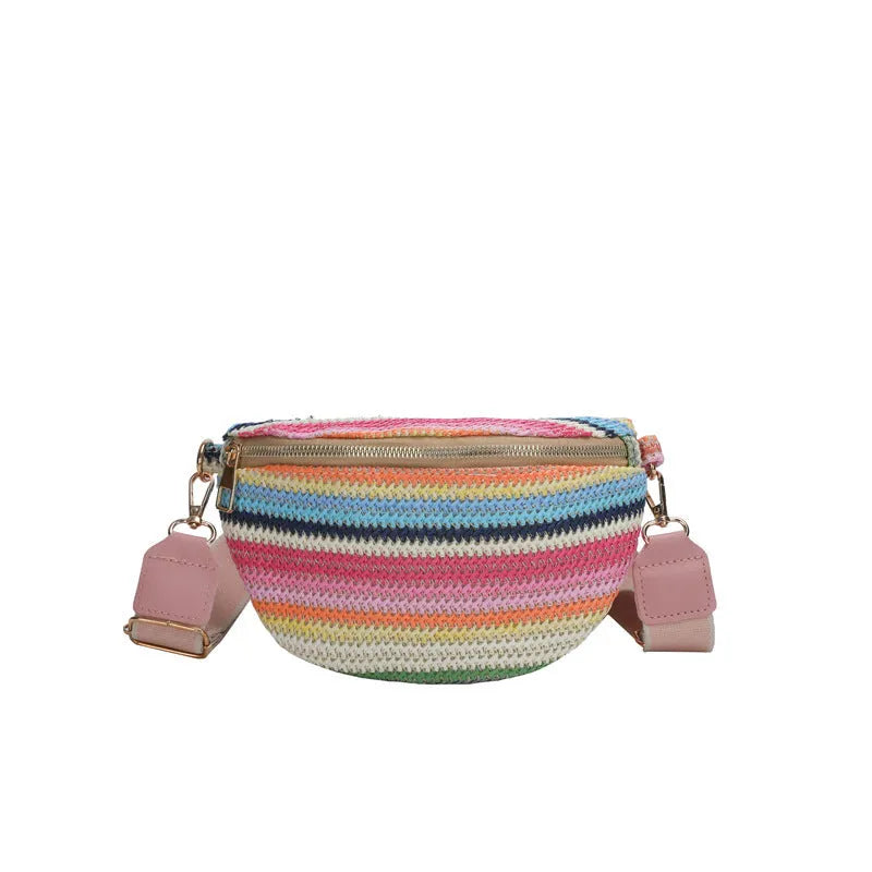 Blue straw woven women's beach bag with single shoulder strap and zippered compartment