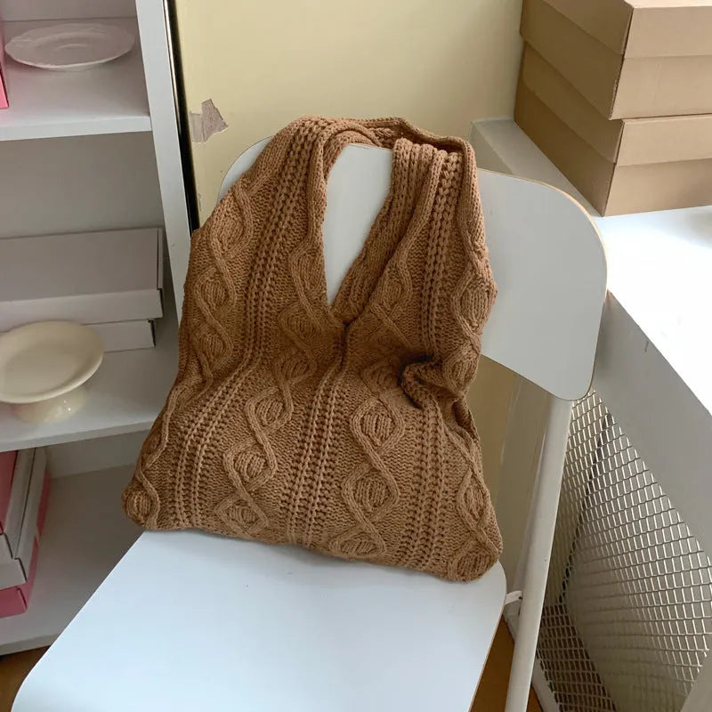 Women's retro style hollow knitted polyester tote bag in a solid colour, showing large open top and textured yarn material.