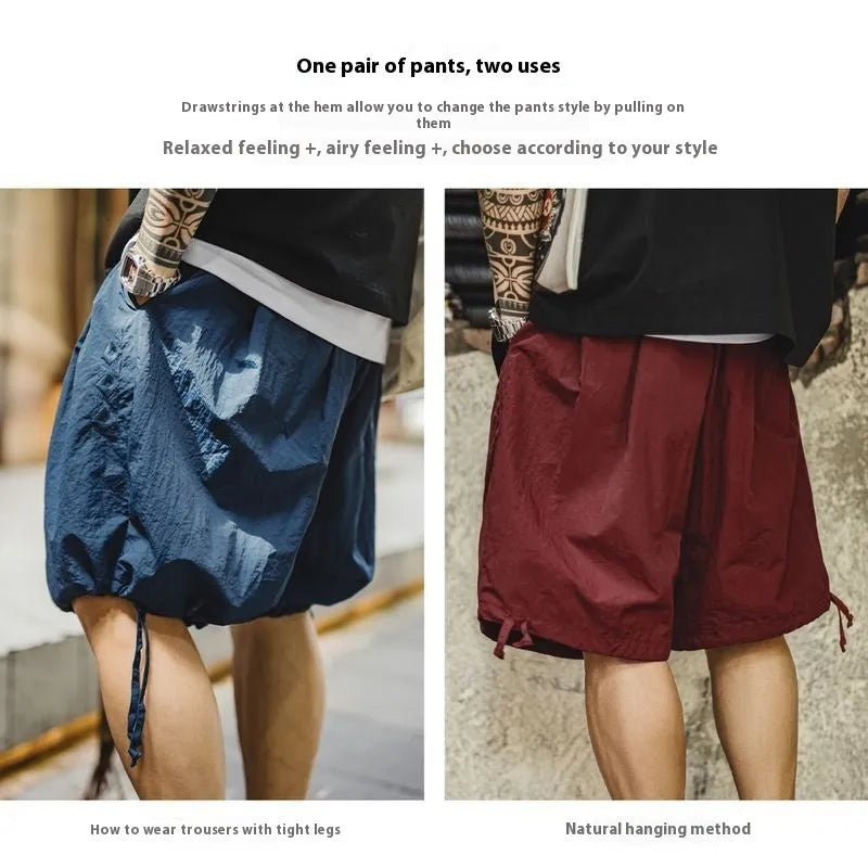 Men's loose fit embroidered shorts in Prussian blue colour with thin nylon fabric