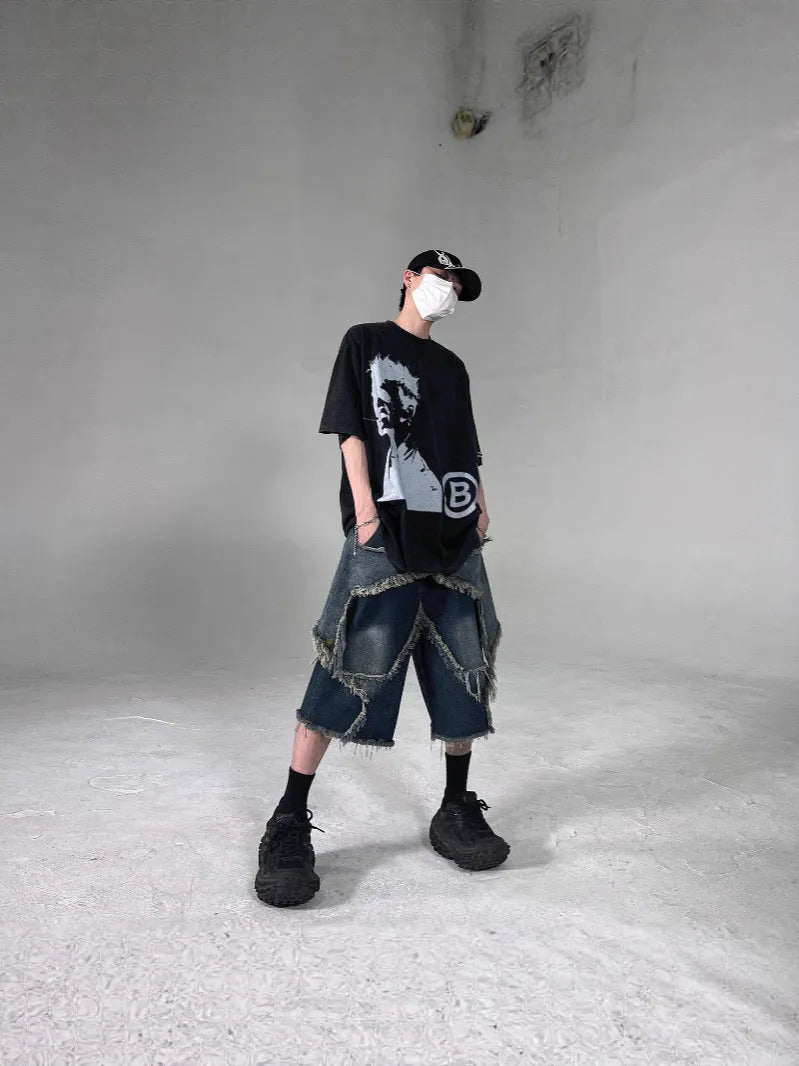Blue men's denim shorts with frayed hem and five-pointed star patch in retro American style