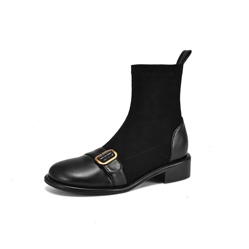 Black women's low heel Martin boots with front lace-up and decorative belt buckle stitching on a round toe.
