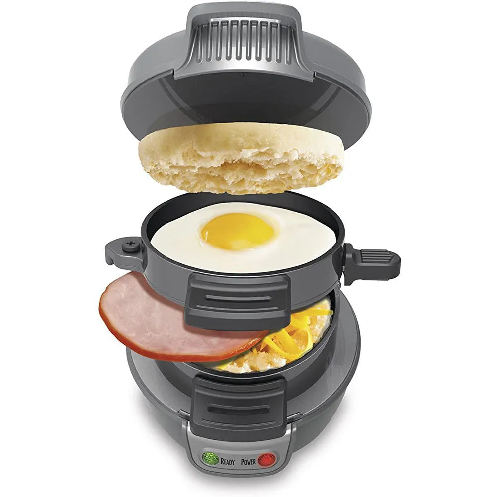 Bright red household breakfast machine sandwich maker with egg cooker ring and two baking trays.