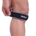 Black and grey edged patella retinaculum knee support for adult sports.