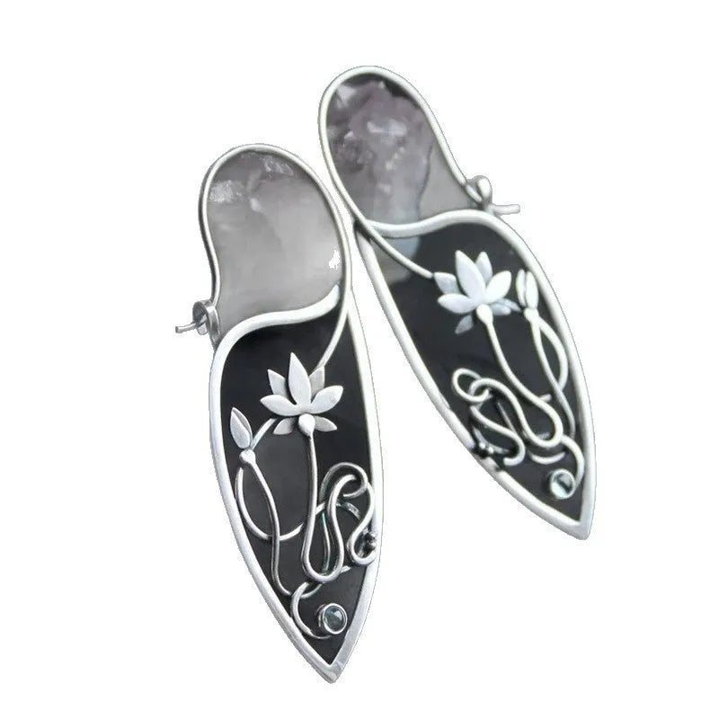 Silver rhinestone earrings with lotus vine design featuring geometric floral shapes and round crystal elements